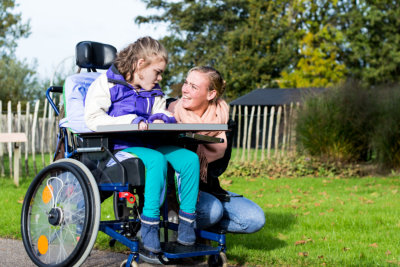 caregiver and her patient outdoors